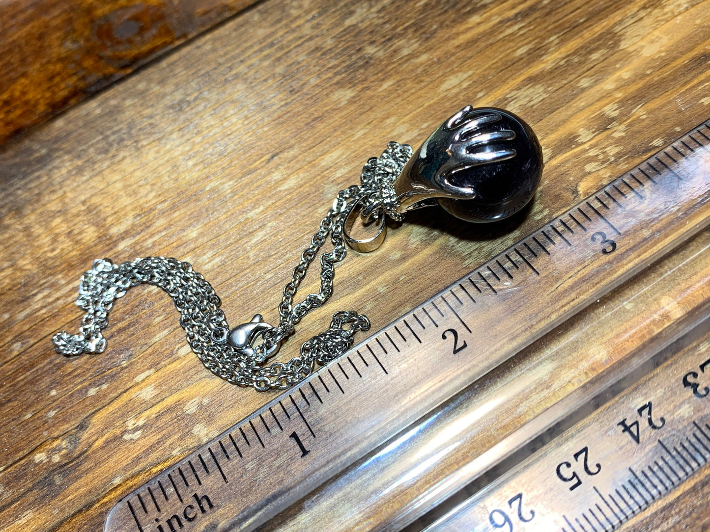 Amethyst In Universal Hands Necklace NCK-0293