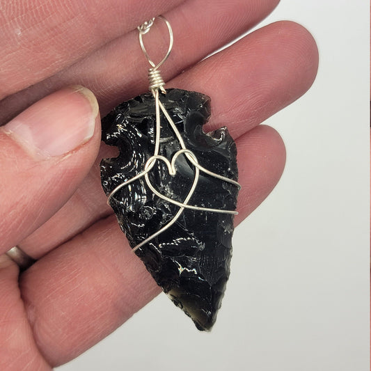 black obsidian 1 1/2" arrowhead, silver wire wrapped, handmade, pendant attarched to a silver chain