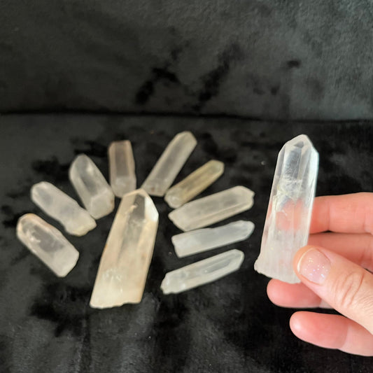 Shimmering 1-pound Quartz crystals with intricate formations, perfect for crystal enthusiasts, collectors and retailers.  