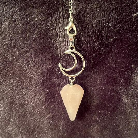 1 inch rose quartz pendulum attatched to an 8 inch silver chain including chakra beads amd a silver crescent moon.