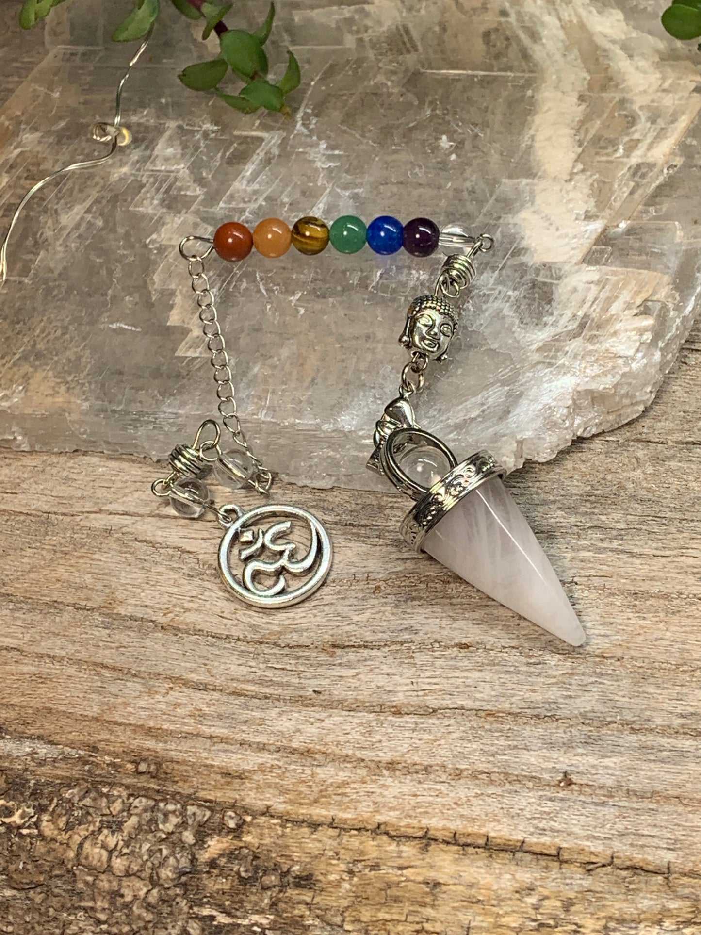 1 inch amethyst pendulum attatched to 8 inch chain including a silver crescent moon