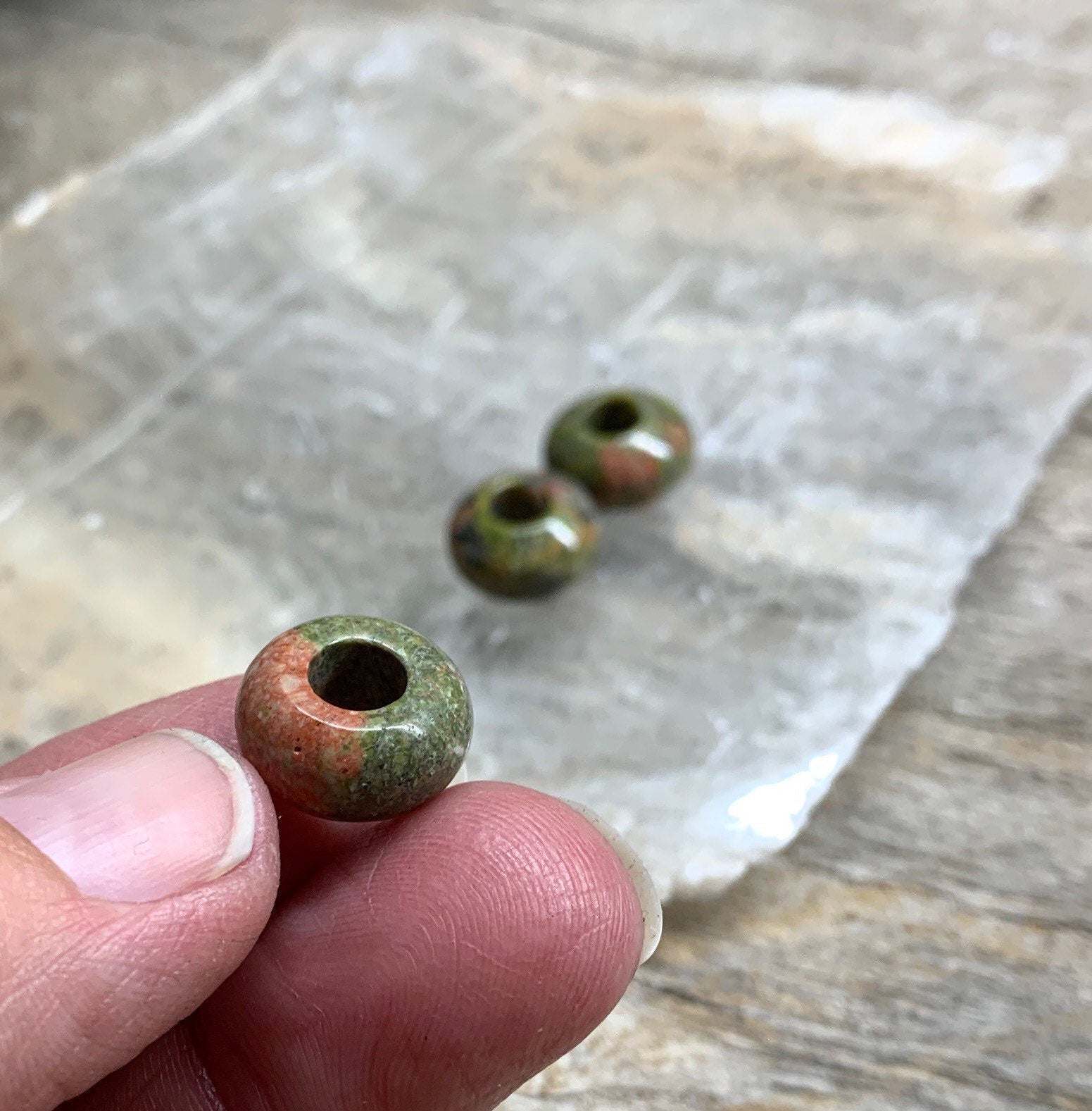 Unakite Jasper beads featuring earthy green and peach tones