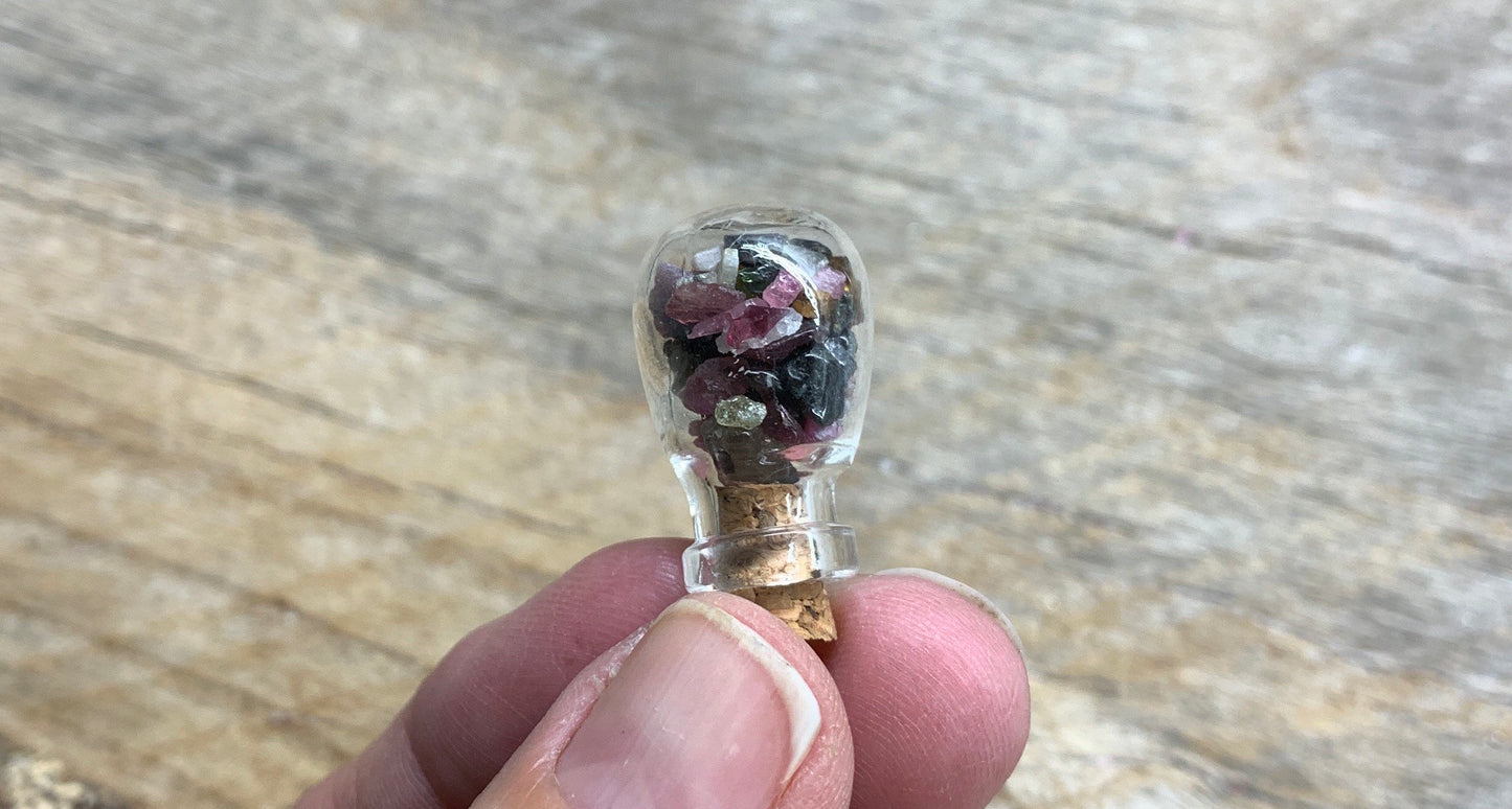 Tourmaline Necklace in Corked Round Bottle. 24” chain. 1147