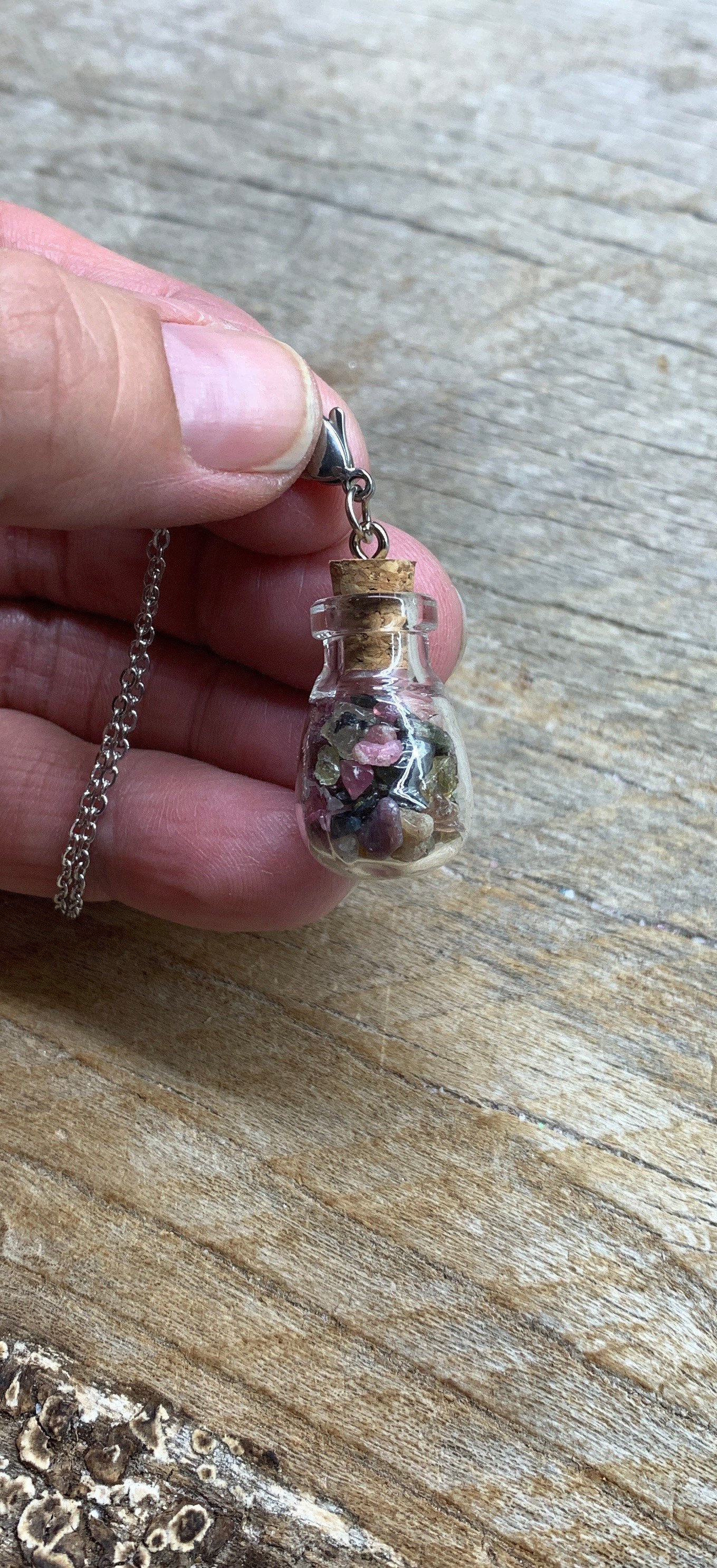 Tourmaline Necklace in Corked Round Bottle. 24” chain. 1147