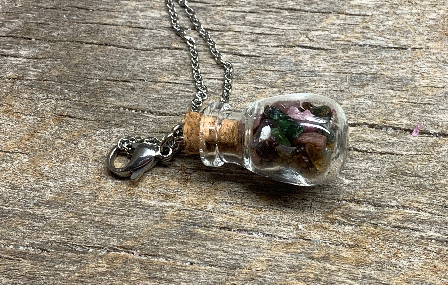 Tourmaline Necklace in Corked Round Bottle. 24” chain. 1147