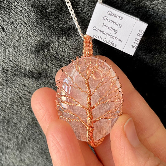  tree of life copper wire wrapped clear quartz oval stone pendant attatched to a silver chain